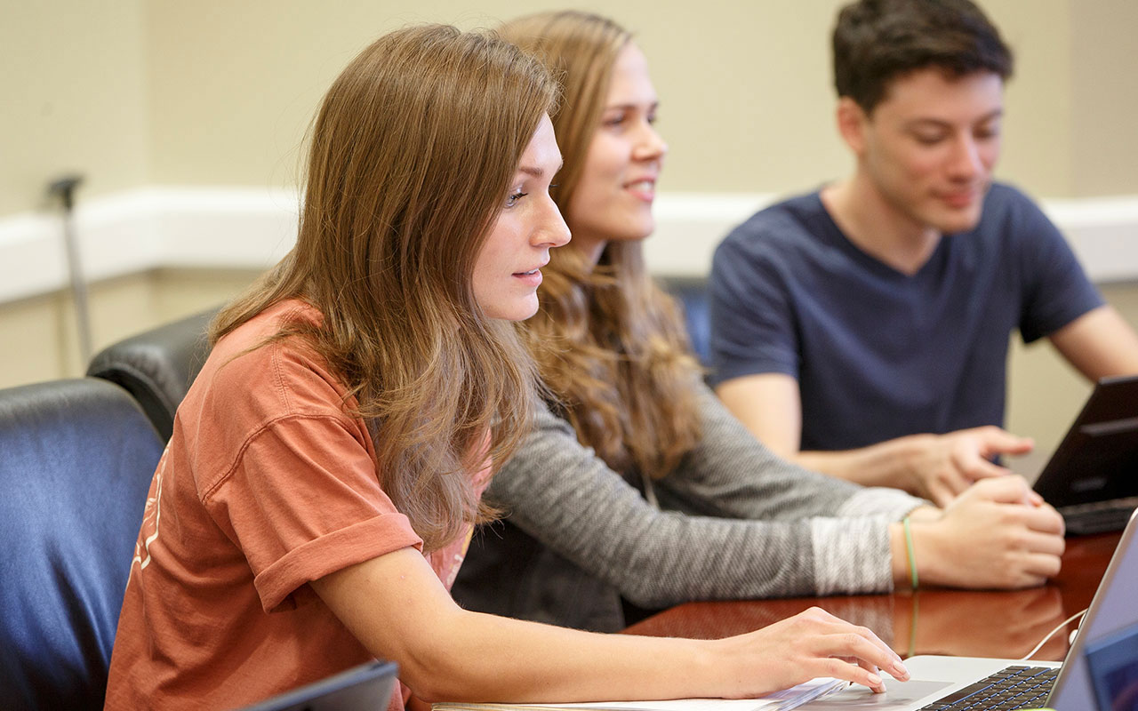 A student uses a laptop computer.