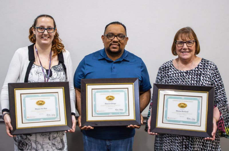 The 2023 McLemore Award winners are (from left) Megan Del Mar, Marcos Ortega and Marna Morland.