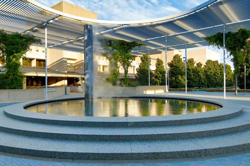 The misting column and trellis in the center of campus.