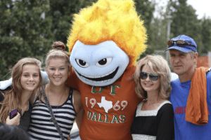 Family with UTD mascot Temoc