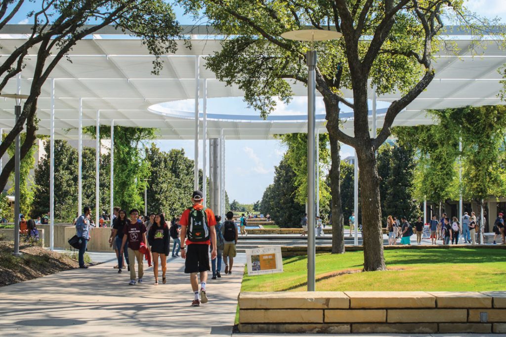 Students walking near Trellis Plaza