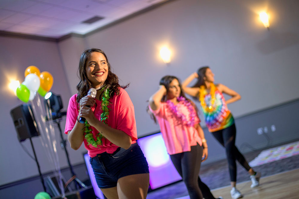 Students dancing and singing