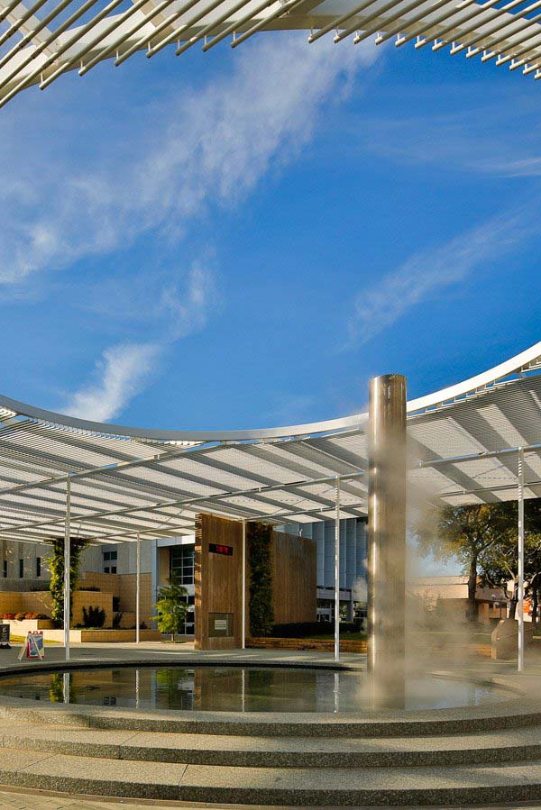 Misting column and reflecting pool at Trellis Plaza