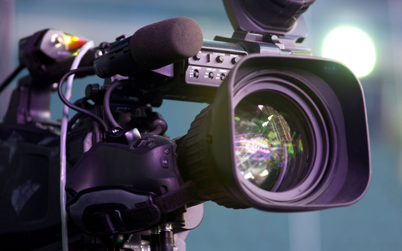 A closeup photo of a video camera.