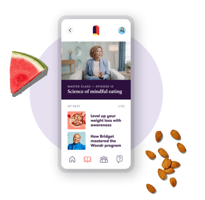 Watermelon slice, almonds and the Wondr app on a phone